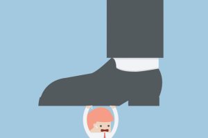 Why does bullying happen in schools?